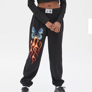 New Girl Order for Urban Outfitters Butterfly & flame black sweatpants
